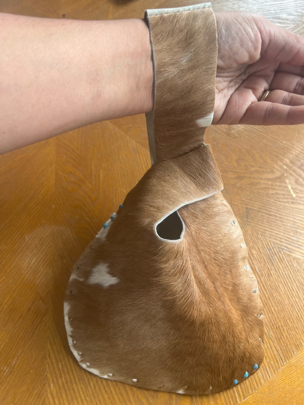 Handheld Cowhide Wristlet Bag in Brown and White